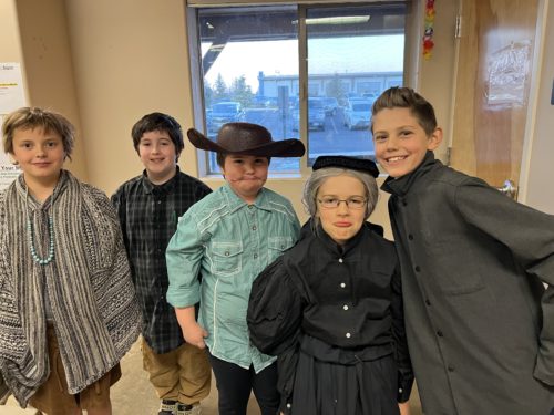 5 students dressed up as historical characters