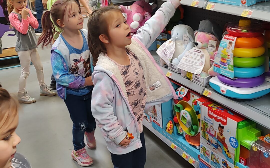 PPOS Students at Walmart looking at toys