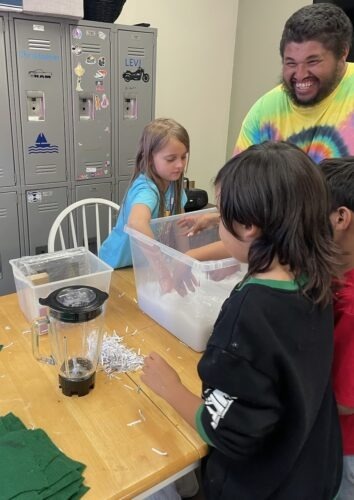 Third- and fourth-graders at PPOS work with the Aspen House community on a holiday card fundraiser.